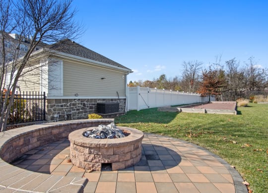 a backyard with a fire pit at Glen Mills in Glen Mills, PA