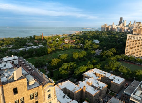 an aerial view of the city and the lake at the Belden Stratford in Chicago, Illinois 60614