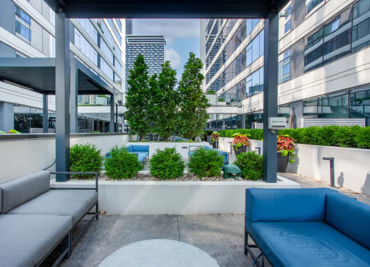 Outdoor Patio with Seating and Landscaping at The Grand Central Apartments in Chicago, IL 60607