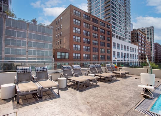 Poolside Lounge Chairs at The Grand Central Apartments in Chicago, IL 60607