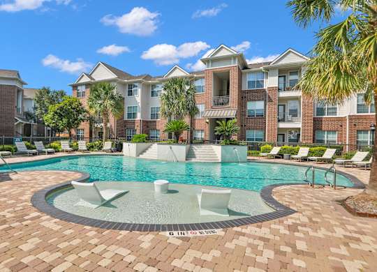 Outdoor Resort Style Pool at Madison on the Meadow Apartments in Stafford, TX 77477