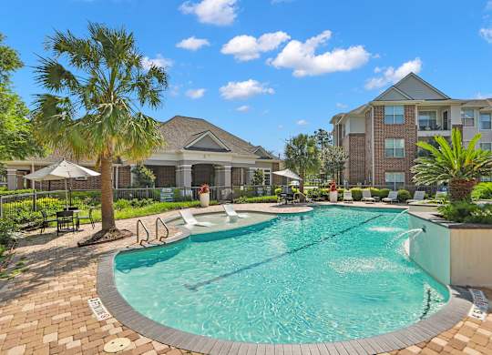 Outdoor Resort Style Pool at Madison on the Meadow Apartments in Stafford, TX 77477