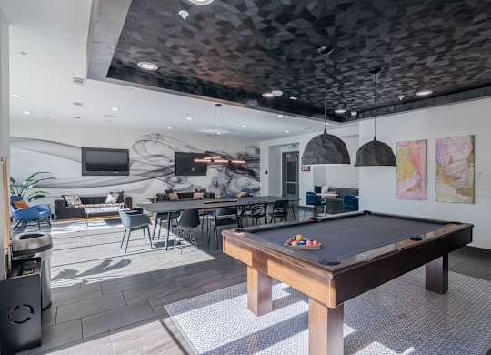 Billiards Table in an Updated Resident Clubhouse at Abstract at Design District in Dallas TX, 75207