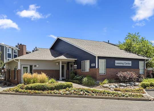 the exterior of a building with a landscaped front yard  at Verona, Littleton, Colorado