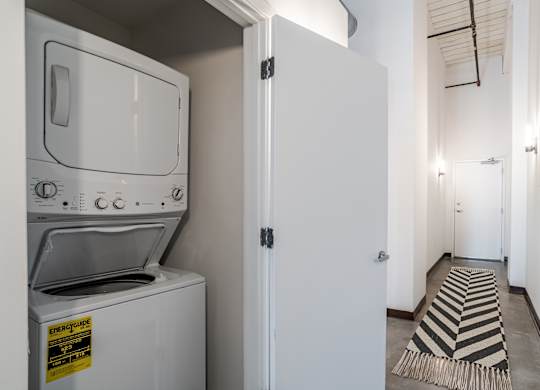stacked washer and dryer at Highland Mill Lofts in Charlotte, NC 28205