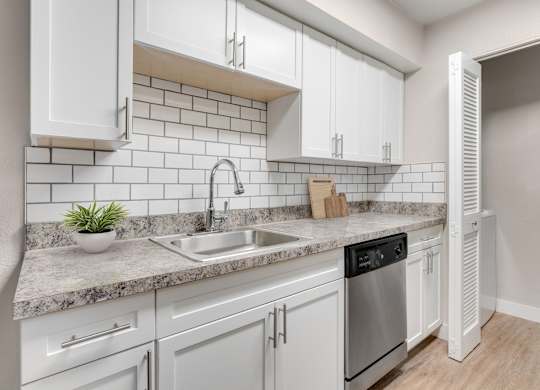 Stainless steel appliances at Verona Apartments in Littleton, CO
