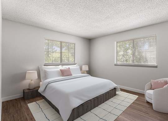 a white bedroom with a large bed and two windows  at Verona, Littleton, CO