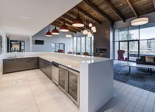 a large kitchen with a large counter top in a house at Ashford Belmar Apartments, Lakewood, CO