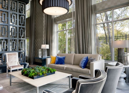 a living room filled with furniture and a large window Heights at Glen Mills, Pennsylvania