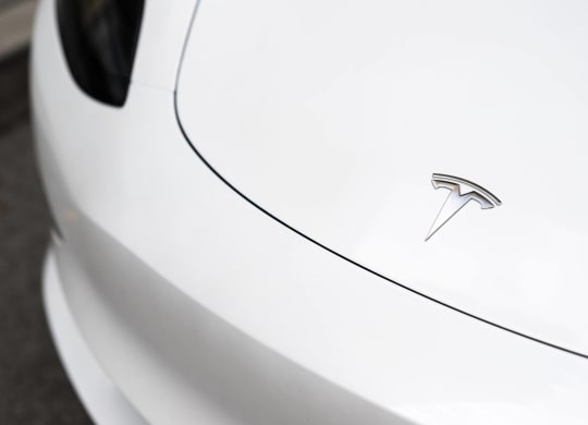 the badge on the side of a white car  at The Belden Stratford, Illinois