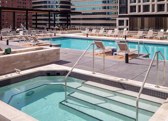 Swimming Pool And Relaxing Area with a hot tub at 365 Nicollet, Manchester