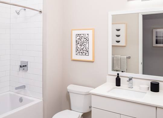 Large Soaking Tub In Bathroom with white cabinets at 365 Nicollet, Minneapolis, 55401