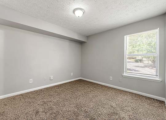 Master bedroom at Bradford Gwinnett & Townhomes in Norcross, GA 30071