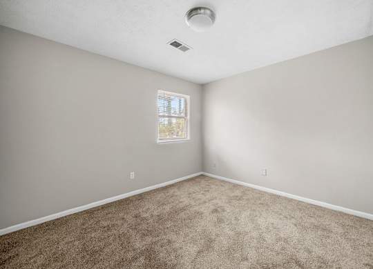 Bedroom at Bradford Gwinnett & Townhomes in Norcross, GA 30071