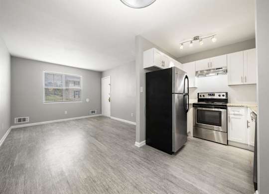 kitchen with white cabinets and stainless steel  at Georgian Oaks Apartments l & ll* Apartments, Smyrna , GA, 30080