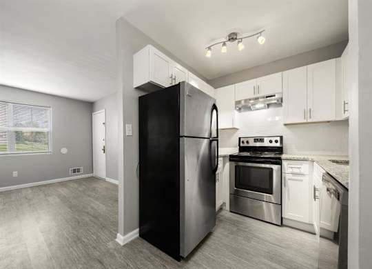 Kitchen with appliances at Georgian Oaks Apartments l & ll* Apartments, Smyrna , 30080