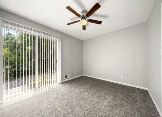 Master bedroom with private patio at Georgian Oaks Apartments l & ll* Apartments, Smyrna , GA