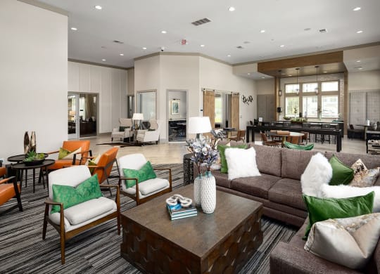 Clubhouse interior  with seating  areas at Carmel Vista, McDonough, 30253