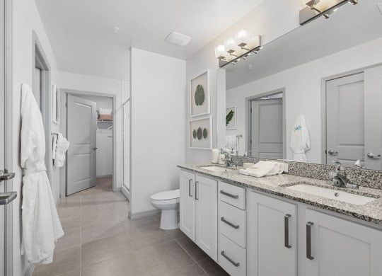 a white bathroom with a sink and a toilet at Inspira, Florida, 34113