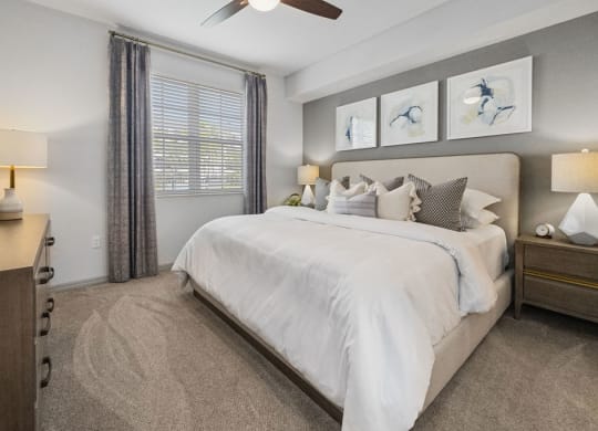 a bedroom with a large bed and a window at Inspira, Naples, FL, 34113