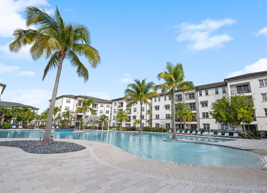 Pool with curves and palm trees at Inspira, Florida