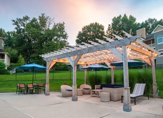 Pool cabana at dusk with the lights on at Madison Glen Mills, Glen Mills, 19342