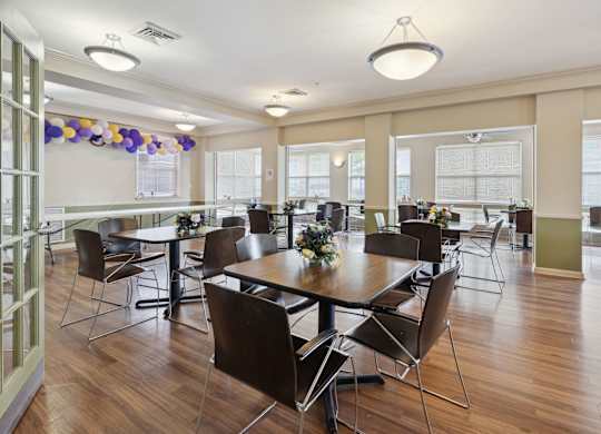 a large room with tables and chairs