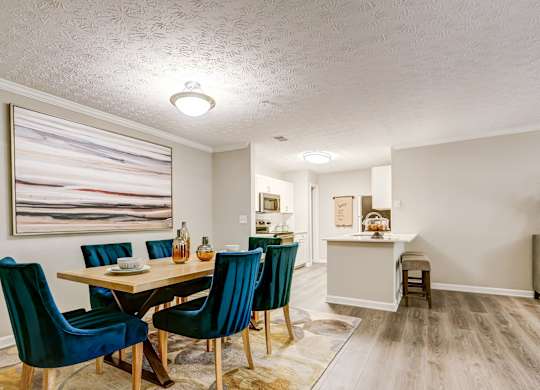 Dining Area With Kitchen View at The Veranda, Lawrenceville, GA