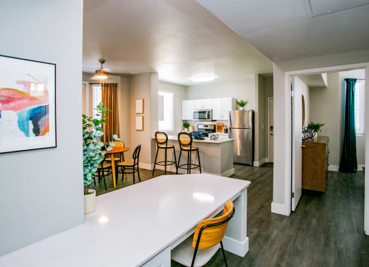 Octave Apartments a kitchen and living room with a white counter top at Octave Apartments, Las Vegas, NV, 89123