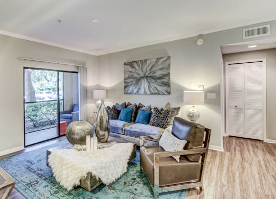 Spacious Living Room With Glass Door at The Preserve at Westchase, Tampa, FL, 33626