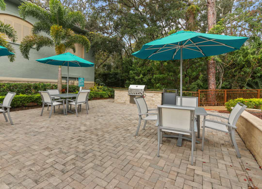 The Preserve at Westchase Apartments outdoor patio with seating