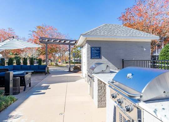 Indigo Apartments Clubhouse Patio with BBQ's