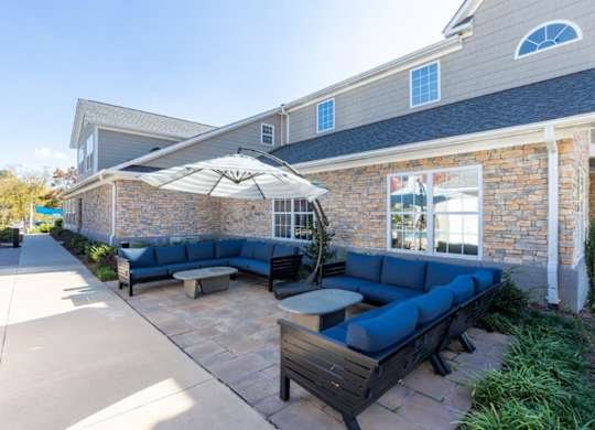 Indigo Apartments Clubhouse Patio with Seating