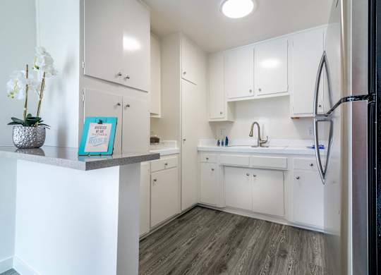 Kitchen with stainless fridge
