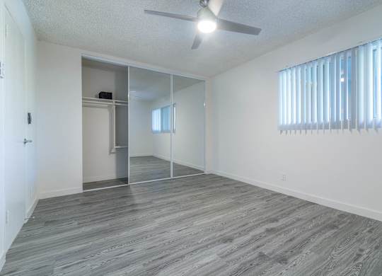 Bedroom view with closet