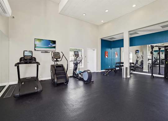 Spacious fitness center with cardio equipment and strength training area at Parc @ 5 Apartments, California, 90240