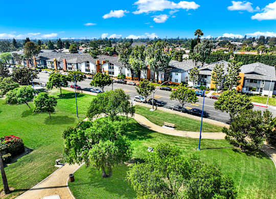 A residential area with houses and greenery at The Square in Downey, CA, 90242