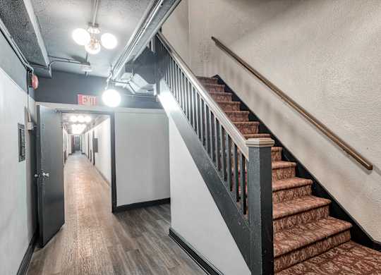 Staircase and open ceiling view