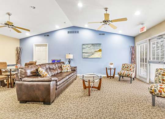 Community clubhouse with vaulted ceilings and lounge seating at Northampton Village Apartments, Indianapolis, IN 46226