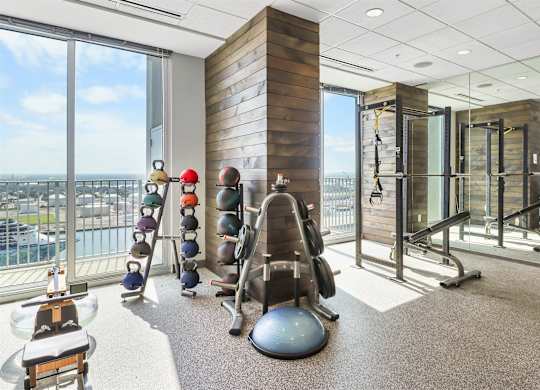 A gym with a view of the city.