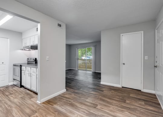 Kitchen With White Cabinetry, Brushed Nickel Hardware & Stainless Steel Appliances
