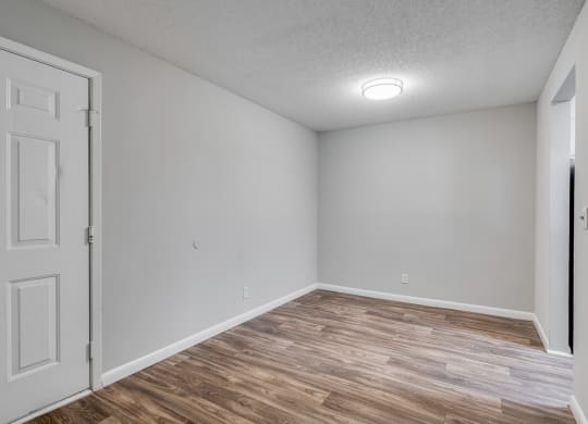 Designated Dining Room Area With Wood-Style Flooring