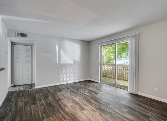 Living Room Area With Peek Through Window  To The Kitchen