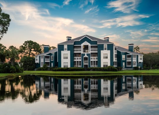 Apartment Homes Overlooking The Pond At Twilight