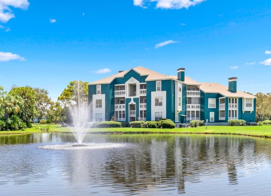 Large Pond & Fountain With Apartment Homes Overlooking