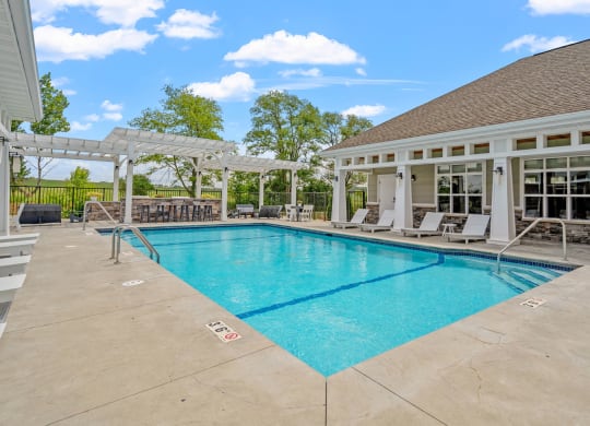 Sparkling Outdoor Pool with Expansive Sundeck