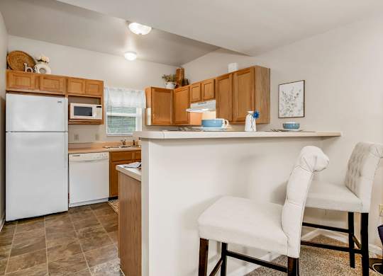 Kitchen with Counter Seating Overhang