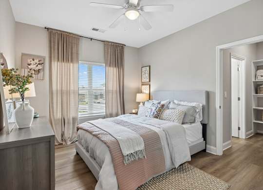 Bedroom with Wood-style flooring