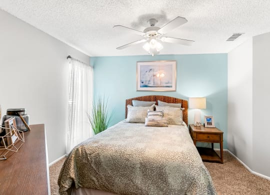 Bedroom Featuring Lots Of Natural Light With Large Window