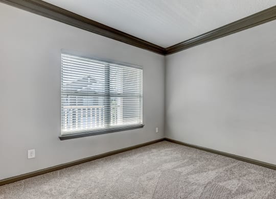 Bedroom Featuring Large Windows